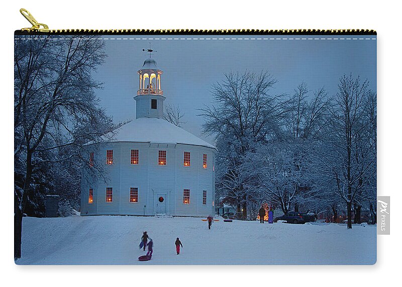 Richmond Round Church Zip Pouch featuring the photograph Sledding at the Richmond Vermont church by Jeff Folger