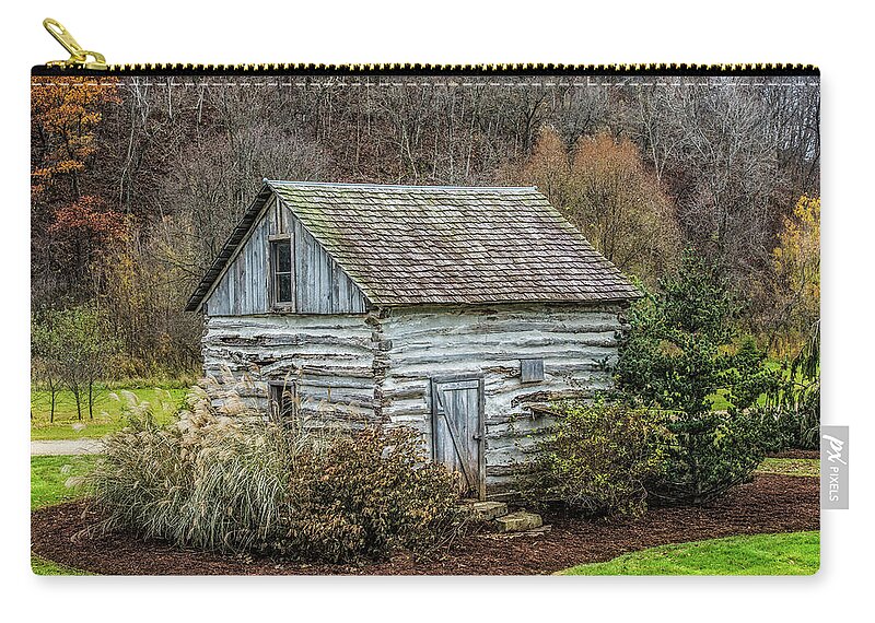 Paul Zip Pouch featuring the photograph Small Log Cabin by Paul Freidlund