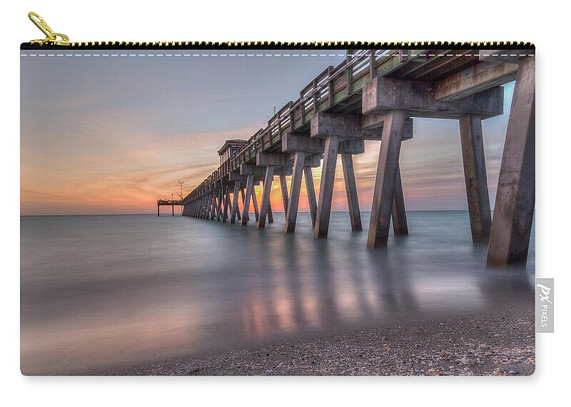 Florida Zip Pouch featuring the photograph Smooth Sunset by Paul Schultz