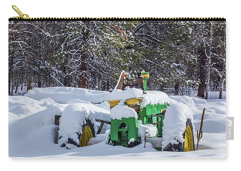 Oregon Zip Pouch featuring the photograph Snow Covered Tractor by Marc Crumpler