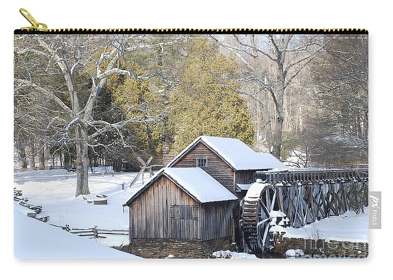 Wildlife Zip Pouch featuring the photograph Snow on the Mill by Eric Liller