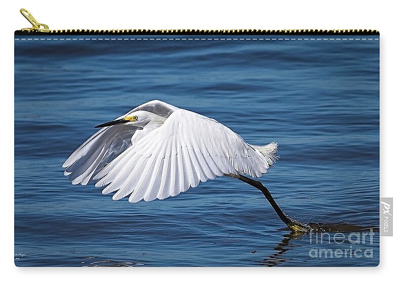 Egret Zip Pouch featuring the photograph Snowy Liftoff by DB Hayes