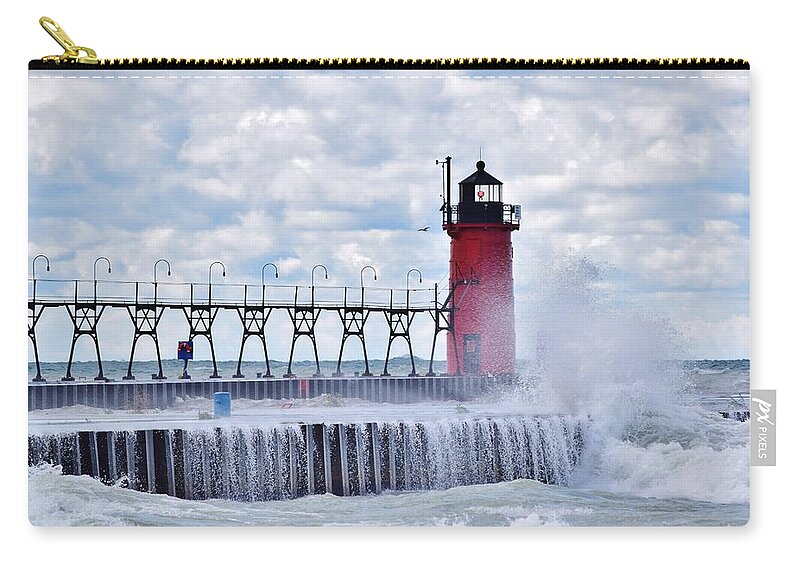 Michigan Carry-all Pouch featuring the photograph South Haven Lighthouse by Nicole Lloyd