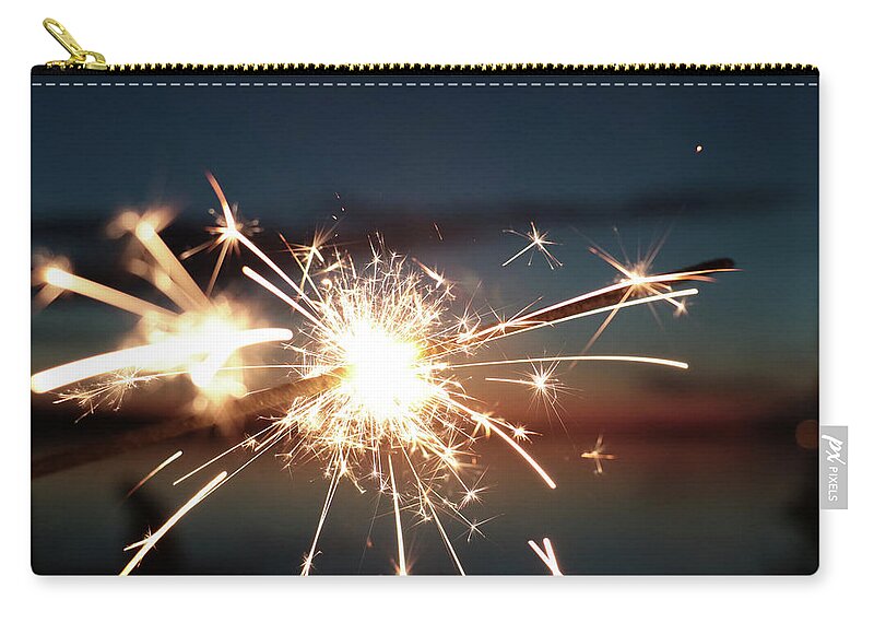 Kelly Hazel Zip Pouch featuring the photograph Sparklers After Sunset by Kelly Hazel