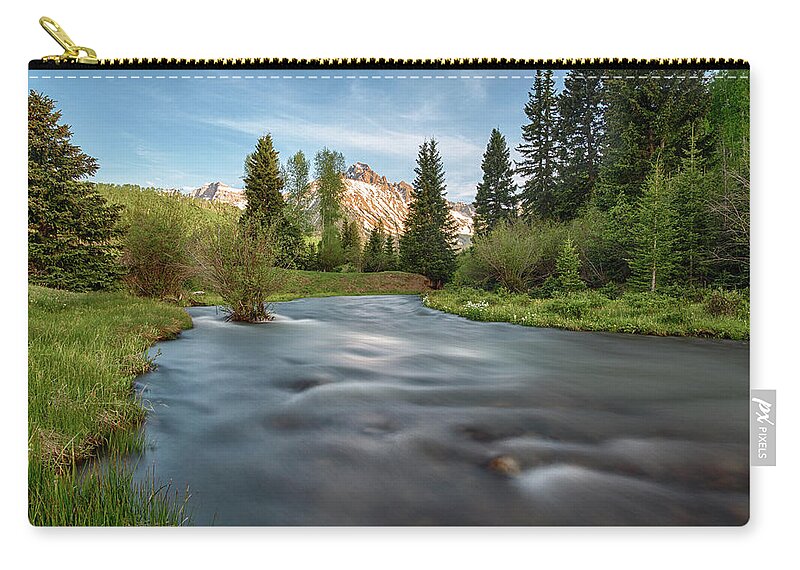 Stream Carry-all Pouch featuring the photograph Spring Melt by Denise Bush