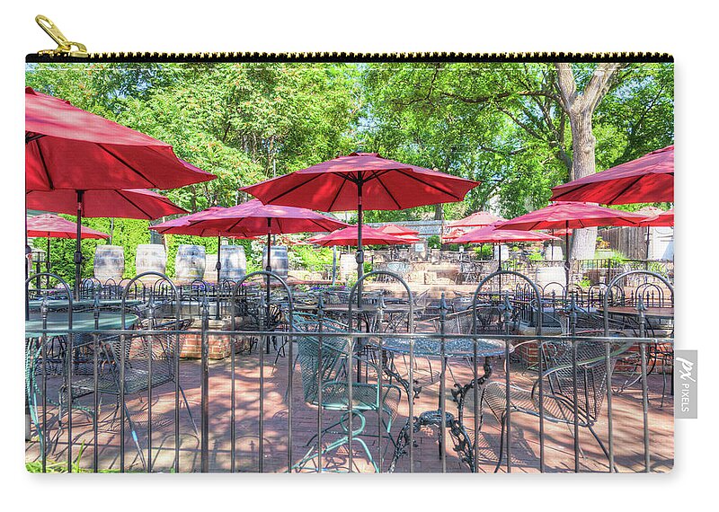 St. Charles Zip Pouch featuring the photograph St. Charles Umbrellas by Spencer McDonald
