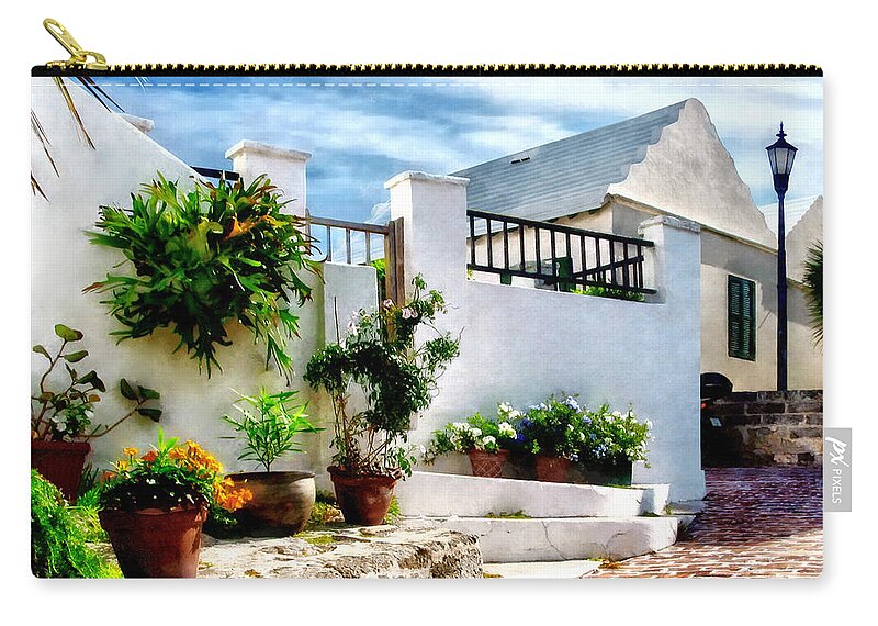 St George Zip Pouch featuring the photograph St George Bermuda - Sunny Street by Susan Savad