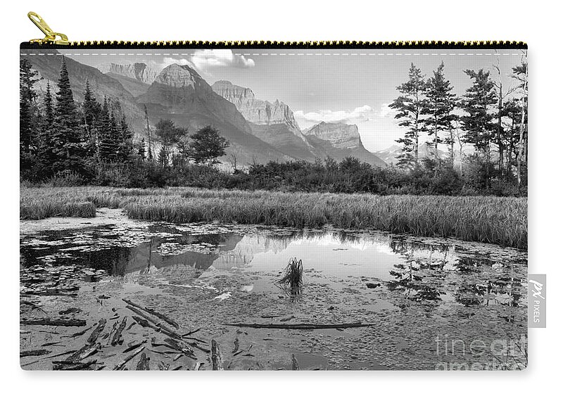 St Mary Lake Zip Pouch featuring the photograph St Mary Peaks Hazy Reflections Black And White by Adam Jewell