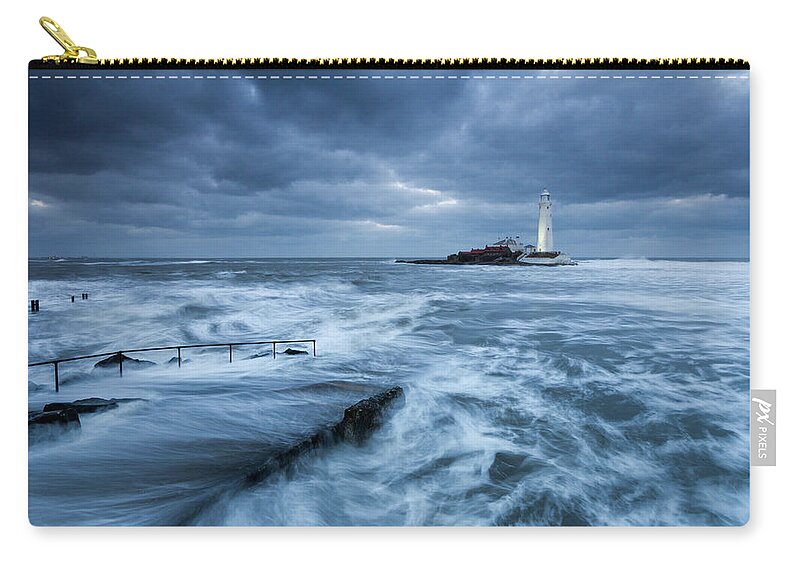 St Mary's Lighthouse Zip Pouch featuring the photograph St Mary's Lighthouse and the cold North Sea by Anita Nicholson