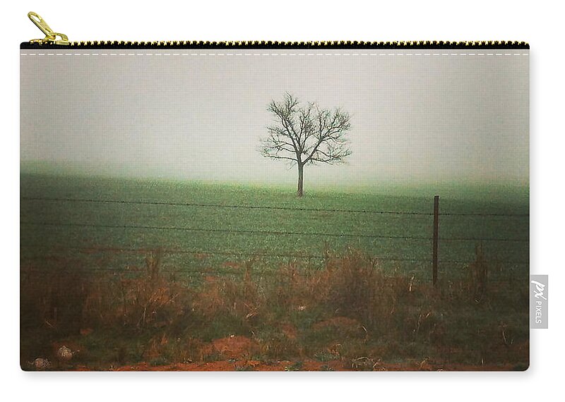 Nature Zip Pouch featuring the photograph Standing alone, a lone tree in the fog. by Shelli Fitzpatrick