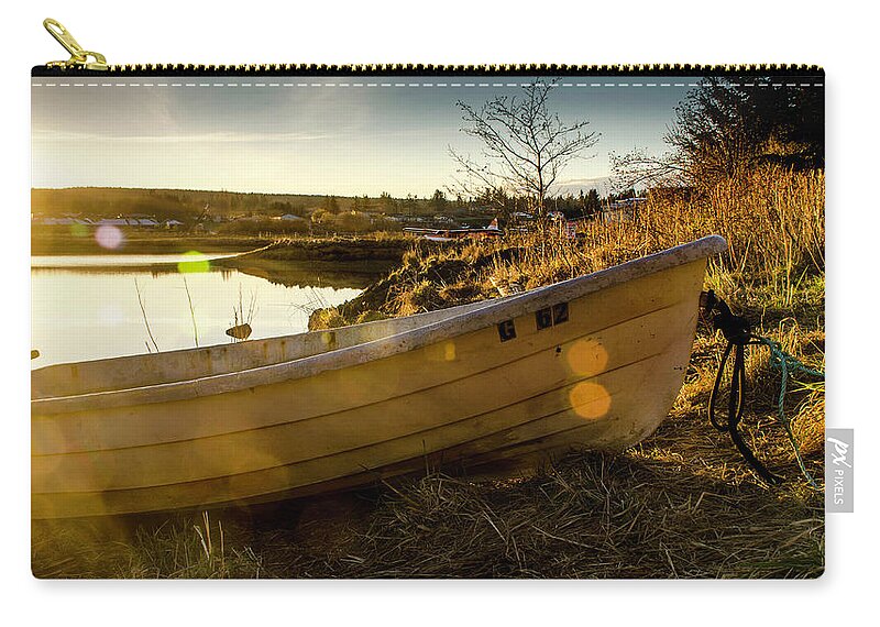 Sunset Carry-all Pouch featuring the photograph Stan's Captured Sunlight by Kathy Paynter