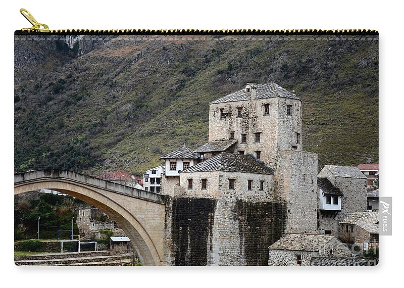 Mostar Zip Pouch featuring the photograph Stari Most Ottoman bridge and embankment fortification Mostar Bosnia Herzegovina by Imran Ahmed
