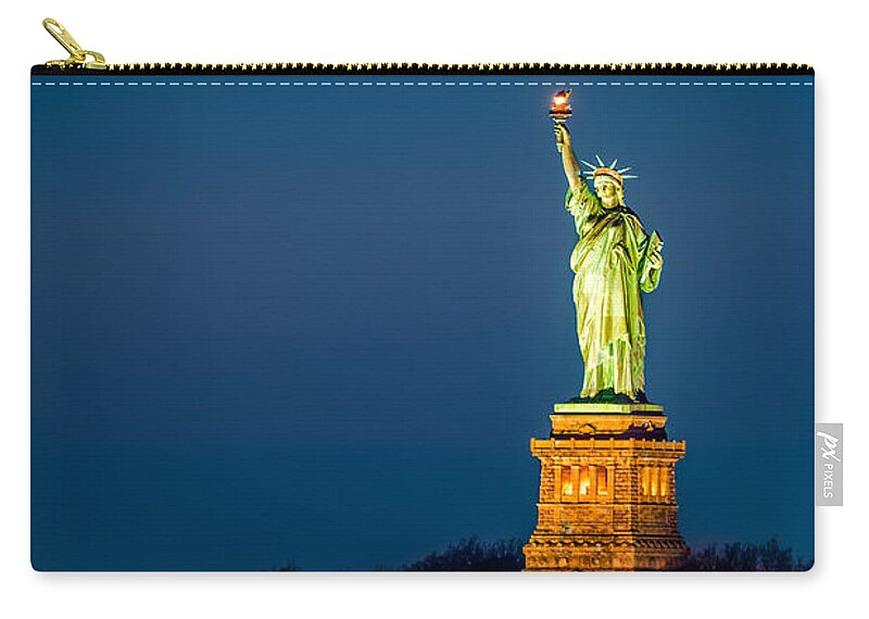 America Zip Pouch featuring the photograph Statue of Liberty and a rising supermoon in New York City by Mihai Andritoiu