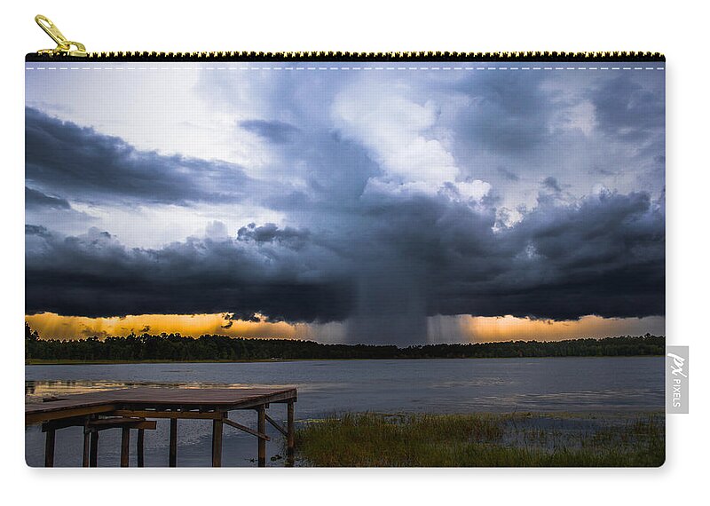 Sunset Zip Pouch featuring the photograph Storm at Sundown by Parker Cunningham