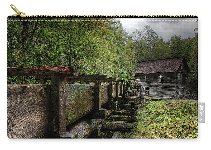 Mingus Mill Zip Pouch featuring the photograph Storm Clouds Over Mingus Mill by Carol Montoya