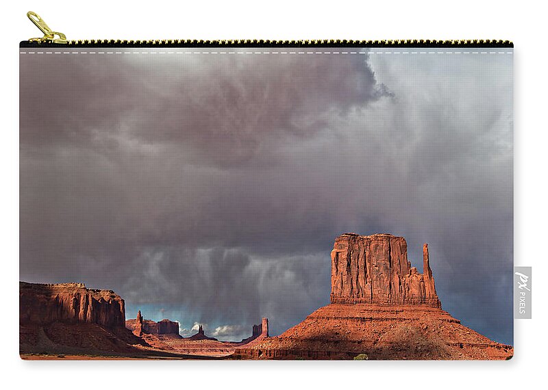 Desert Carry-all Pouch featuring the photograph Storm over Monument Valley by Wesley Aston