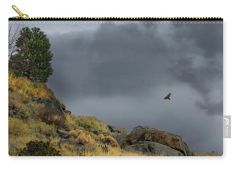 Hawk Zip Pouch featuring the photograph Stormy Flight by Frank Wilson