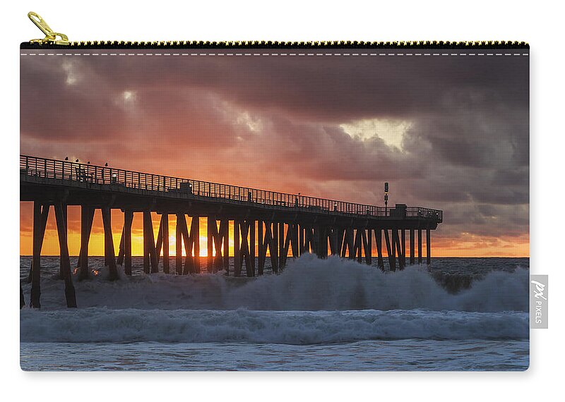 Beach Zip Pouch featuring the photograph Stormy Sunset by Ed Clark