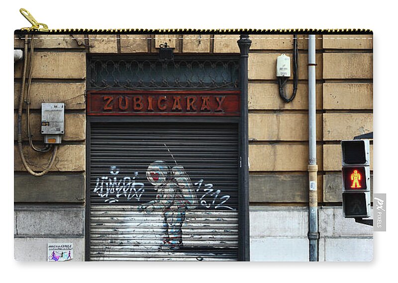 Street Art Zip Pouch featuring the photograph Street Art in Bilbao Spain by James Brunker