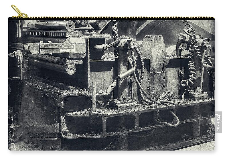 Street Paver Zip Pouch featuring the photograph Street Paver by Tony Locke