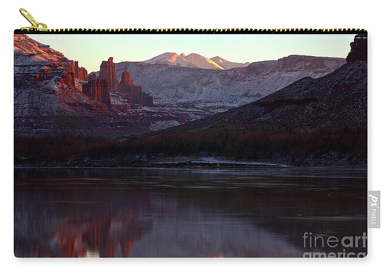 Fisher Towers Zip Pouch featuring the photograph Sun Down At Fisher Towers by Adam Jewell