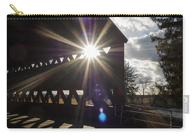 Adams Zip Pouch featuring the photograph Sunlight through Sachs Covered Bridge by Marianne Campolongo