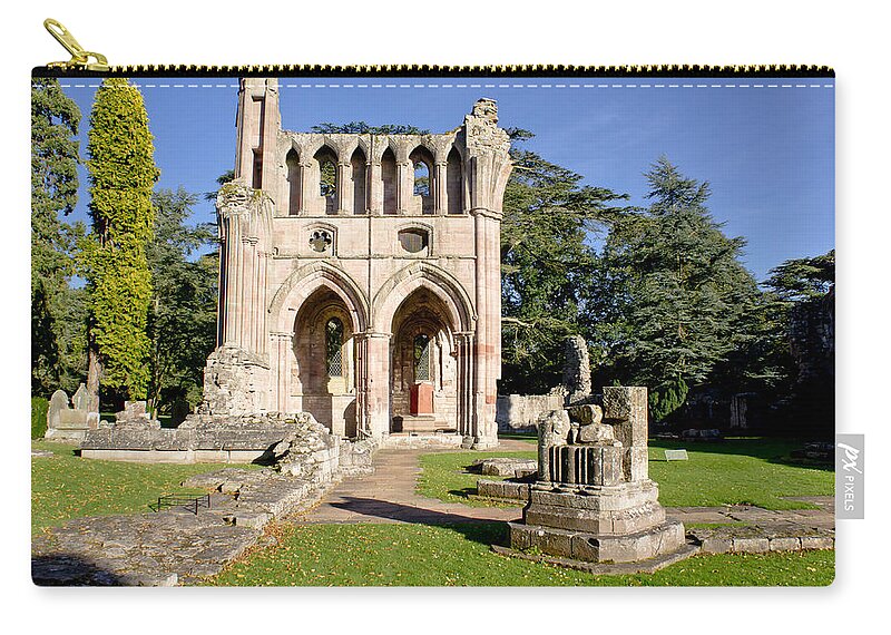 Dryburgh Zip Pouch featuring the photograph Sunny afternoon in Dryburgh Abbey. by Elena Perelman