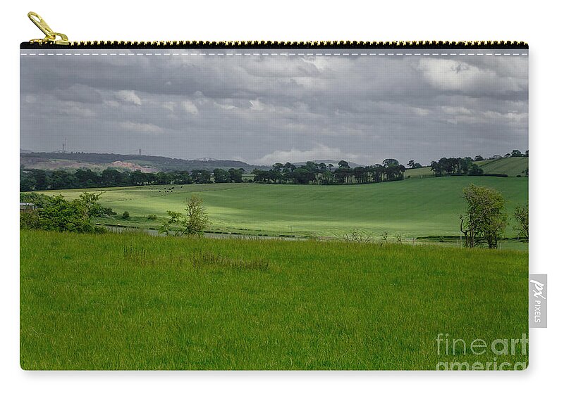 Beecraigs Zip Pouch featuring the photograph Sunny patches on the field. by Elena Perelman