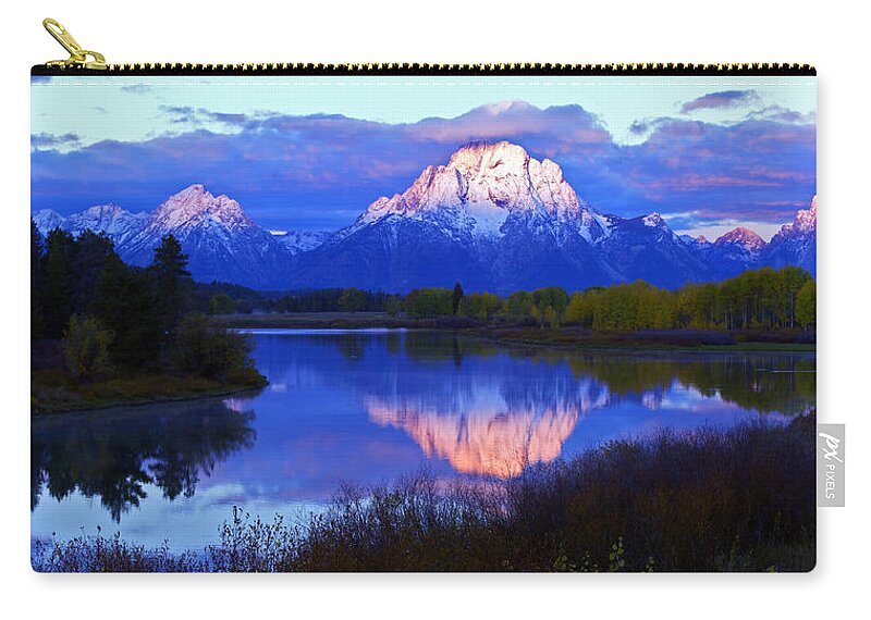 Sunrise Zip Pouch featuring the photograph Sunrise at Ox Bow Bend by Gary Langley