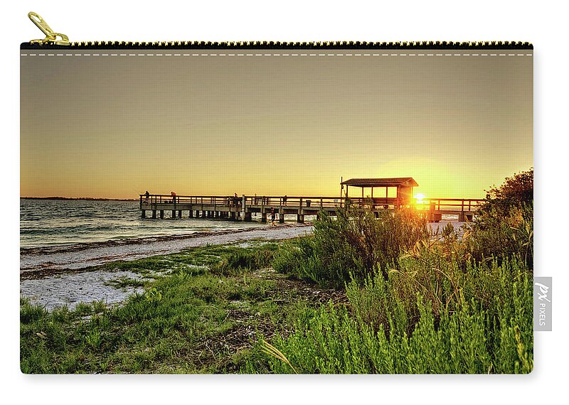 Sanibel Island Zip Pouch featuring the photograph Sunrise At The Sanibel Island Pier by Greg and Chrystal Mimbs