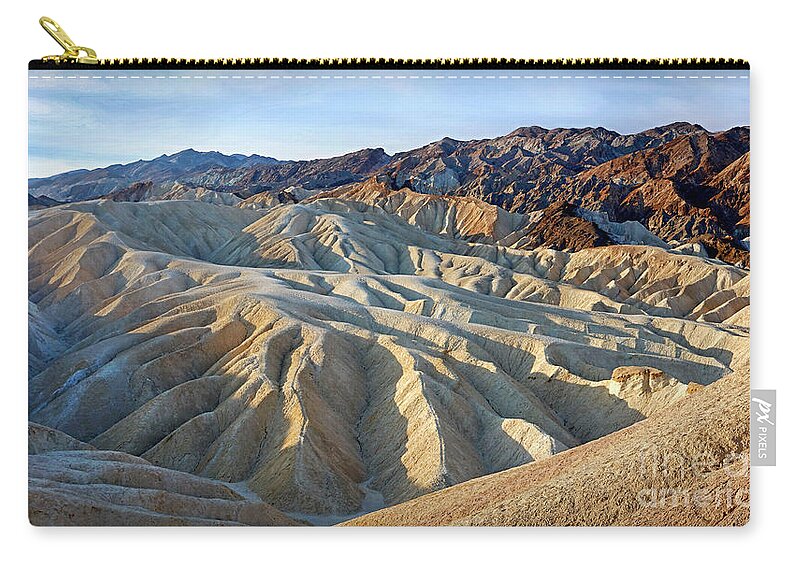 Sunrise Zip Pouch featuring the photograph Sunrise at Zabriskie Point by Martin Konopacki