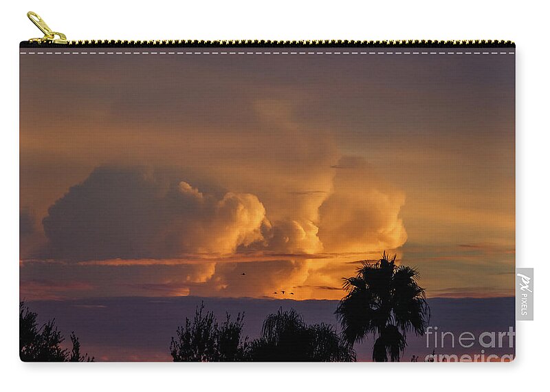 2016 Zip Pouch featuring the photograph Sunrise by Les Greenwood