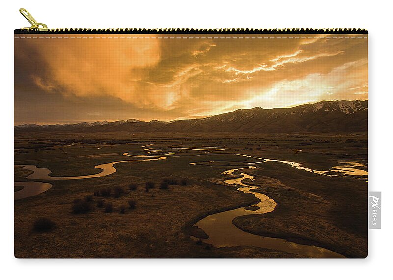 Wyoming Zip Pouch featuring the photograph Sunrise Over Winding Rivers by Wesley Aston
