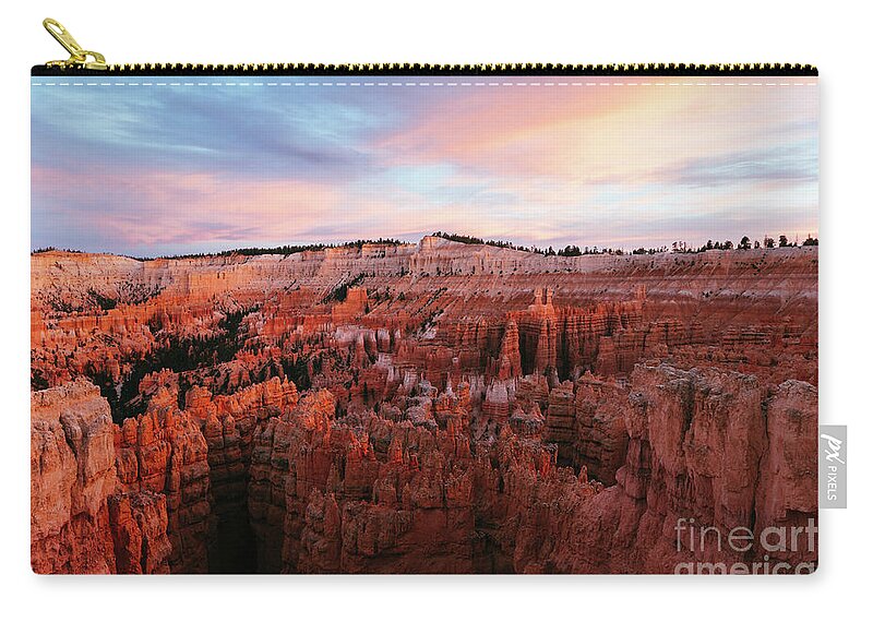 Bryce Canyon Zip Pouch featuring the photograph Sunset at Bryce canyon by Matteo Colombo