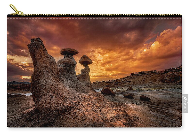 Goblin Valley Zip Pouch featuring the photograph Sunset at Goblin Valley by Michael Ash