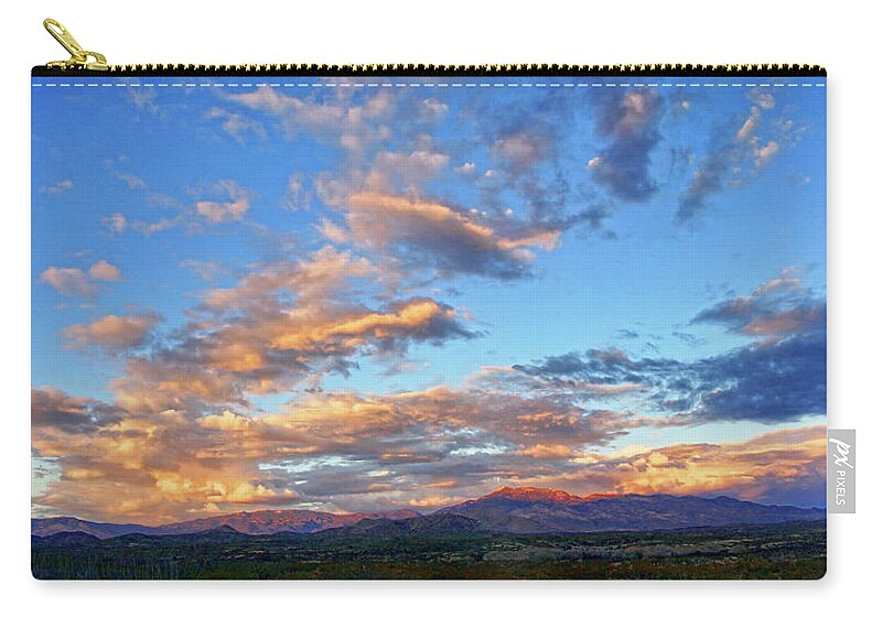 Clouds Zip Pouch featuring the photograph Sunset Glow by Leda Robertson