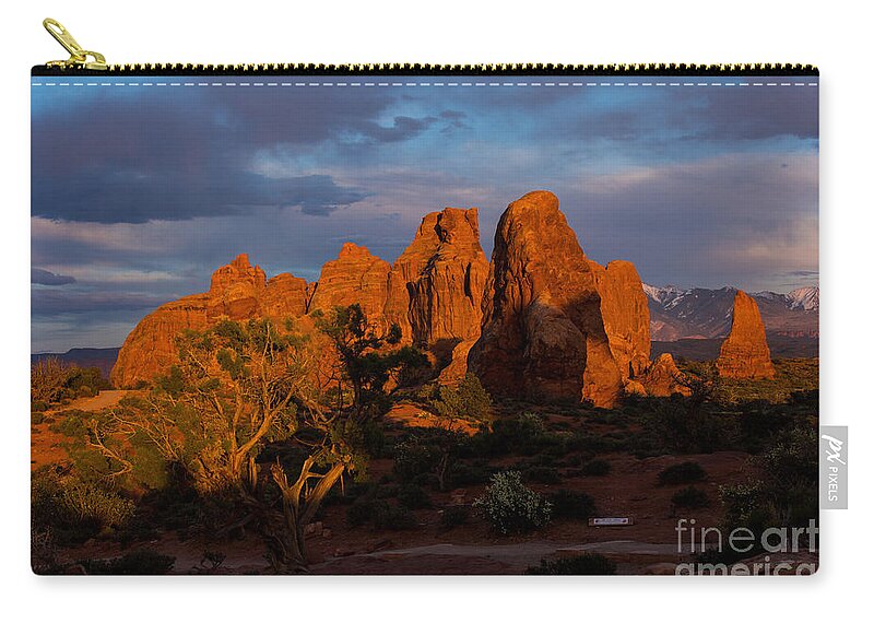Arches Zip Pouch featuring the photograph Sunset in Arches National Park by Agnes Caruso