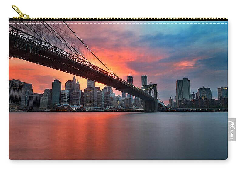 Sunset Zip Pouch featuring the photograph Sunset over Manhattan by Larry Marshall