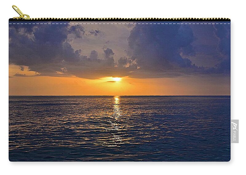 Water Zip Pouch featuring the photograph Sunset Over the Gulf Of Mexico by Carol Bradley