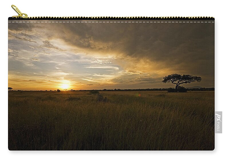 Places Zip Pouch featuring the photograph sunset over the Serengeti plains by Patrick Kain