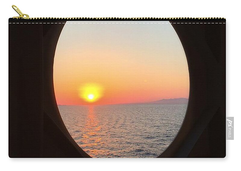 Sunset Through A Porthole Zip Pouch featuring the photograph Sunset through a Porthole by Mark Taylor