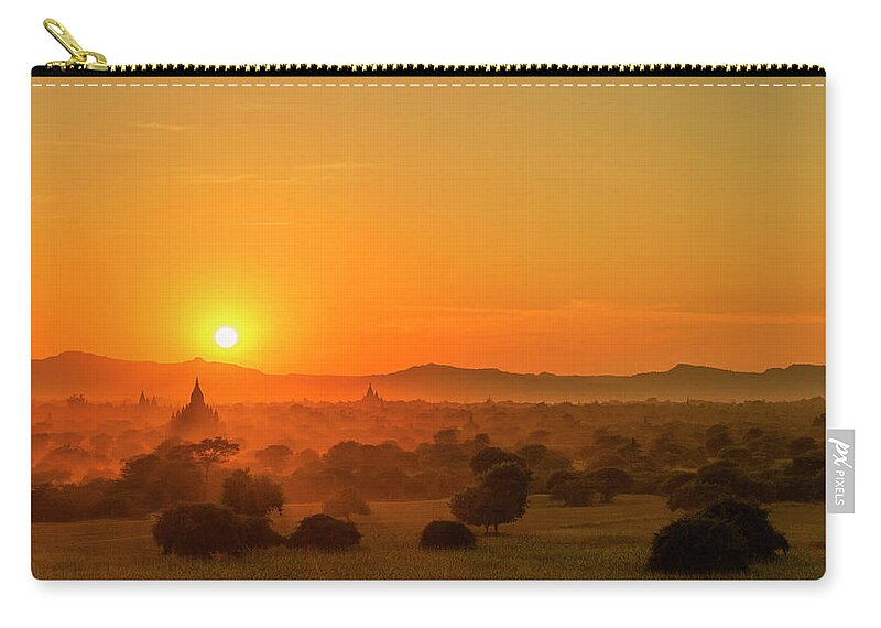 Landscape Zip Pouch featuring the photograph Sunset view of Bagan Pagoda by Pradeep Raja Prints