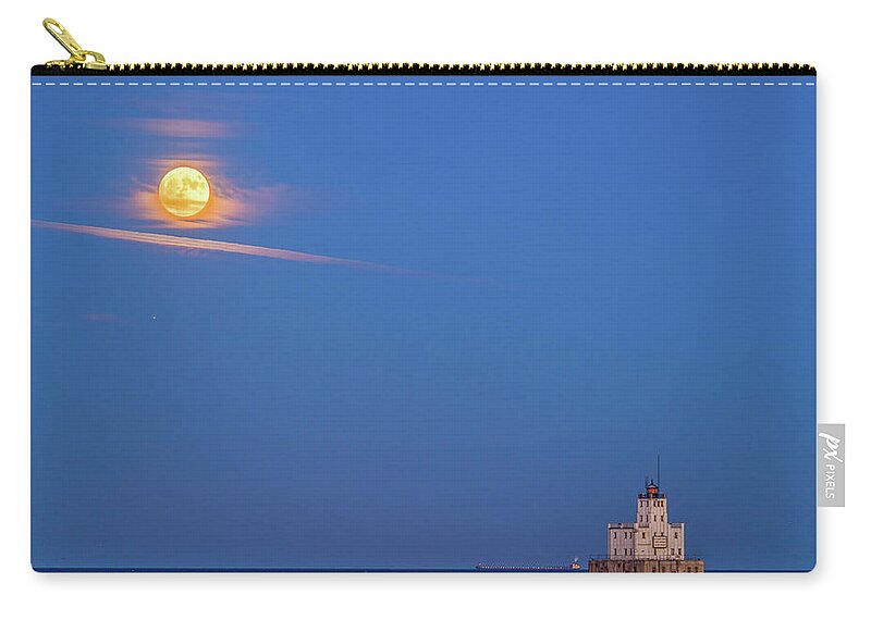 Lake Michigan Zip Pouch featuring the photograph Supermoon over the white lighthouse by Kristine Hinrichs