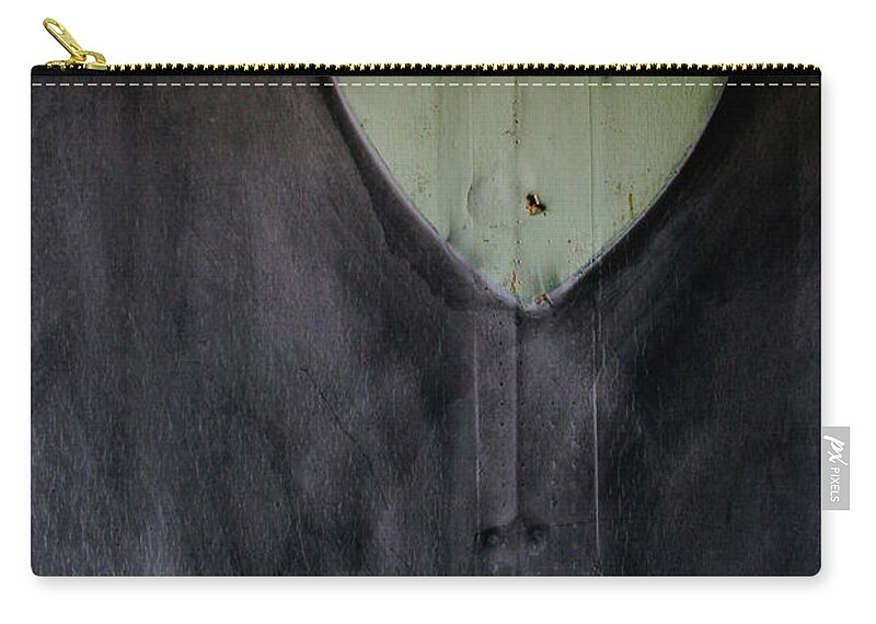 Heart Zip Pouch featuring the photograph Surviving Heart After the Fire by John Harmon