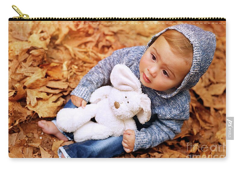 Autumn Zip Pouch featuring the photograph Sweet baby in the autumn park by Anna Om