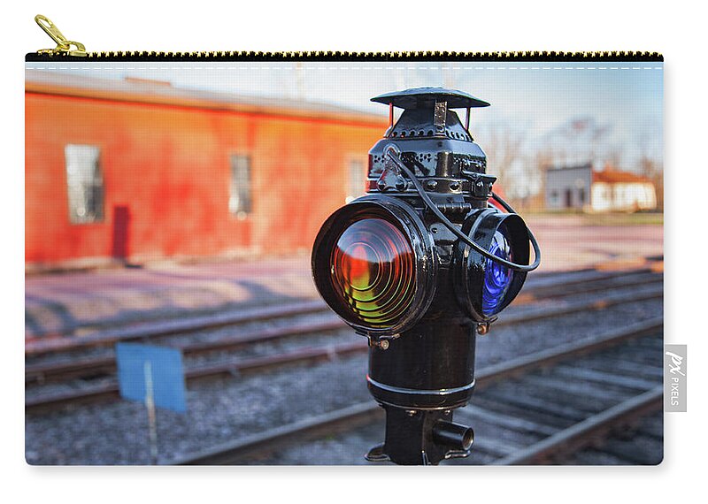 North Freedom Zip Pouch featuring the photograph Switch Lamp by Todd Klassy