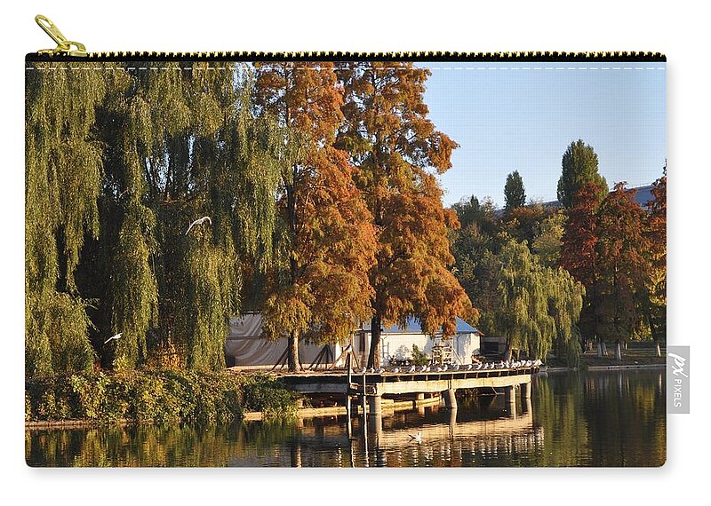 Autumn On The Lake Zip Pouch featuring the photograph Taking a nap by Georgeta Blanaru
