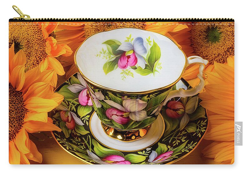 Mood Zip Pouch featuring the photograph Tea Cup And Sunflowers by Garry Gay