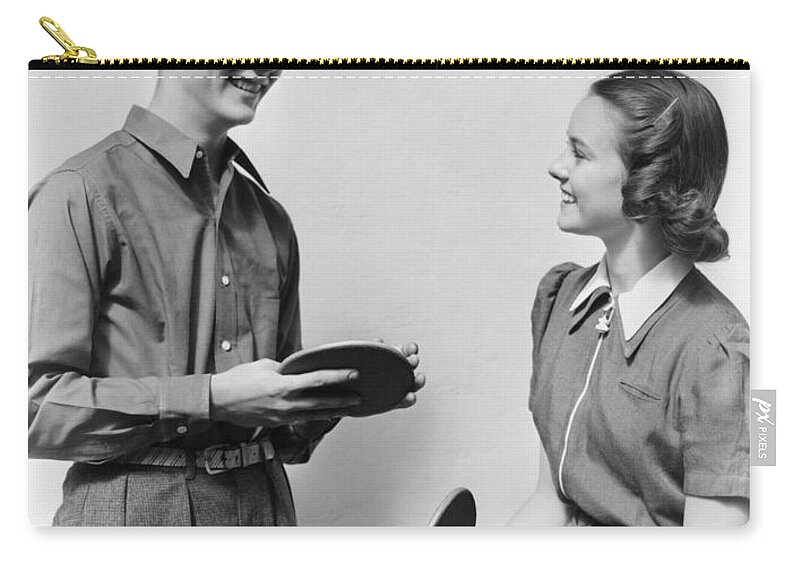 1940s Zip Pouch featuring the photograph Teen Couple With Table Tennis Paddles by H. Armstrong Roberts/ClassicStock