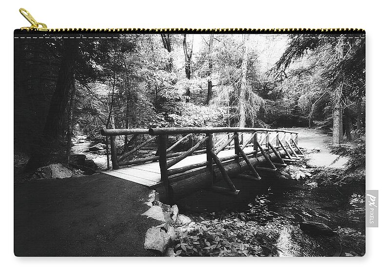 Landscape Zip Pouch featuring the photograph The Bridge Through the Woods in Black and White by Trina Ansel